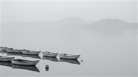 White Boats in Foggy Water